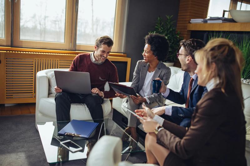 Group of businesspeople talking in the office