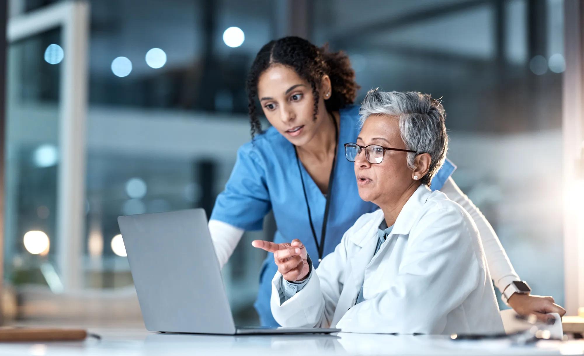 Benefits leader reviewing pharmacy benefit plan data, vaccine coverage, specialty drug utilization, and cost-management insights.