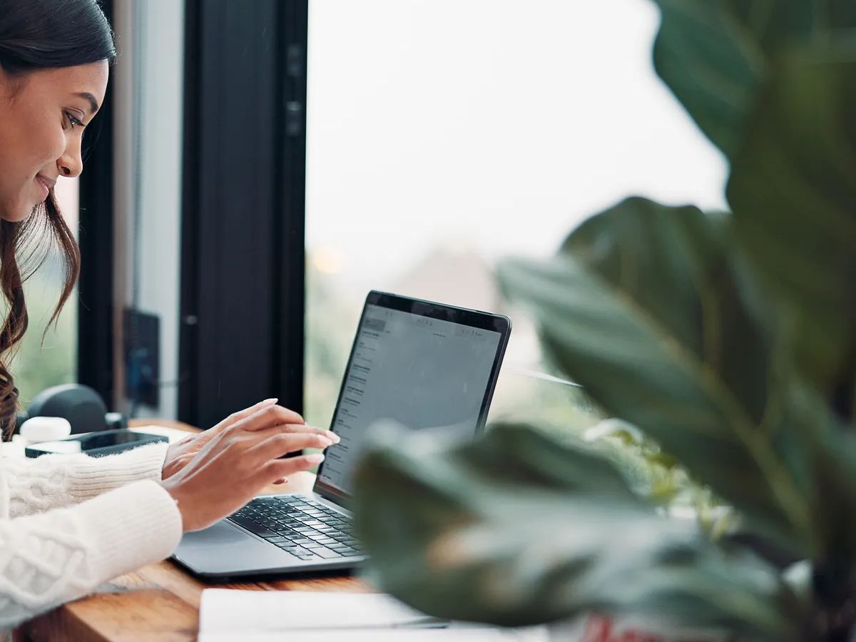 Woman, email or remote work in home with laptop for HR support, payroll or benefits administration. Person, typing or review in house with computer for employee policy, management report or planning