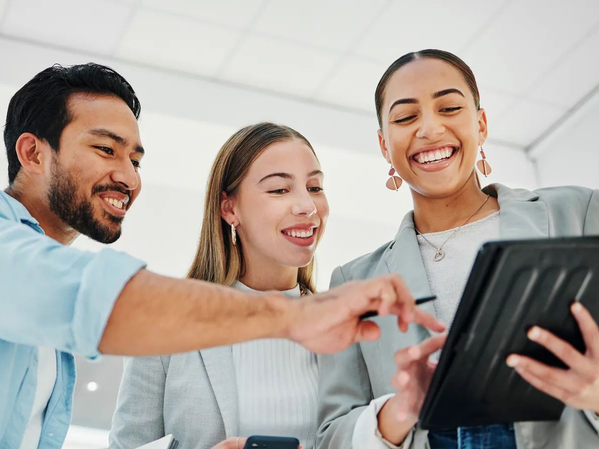 Business people, teamwork and collaboration on tablet for data analytics, marketing results and comparison in office. Professional group of women and man for digital, social media or startup project.