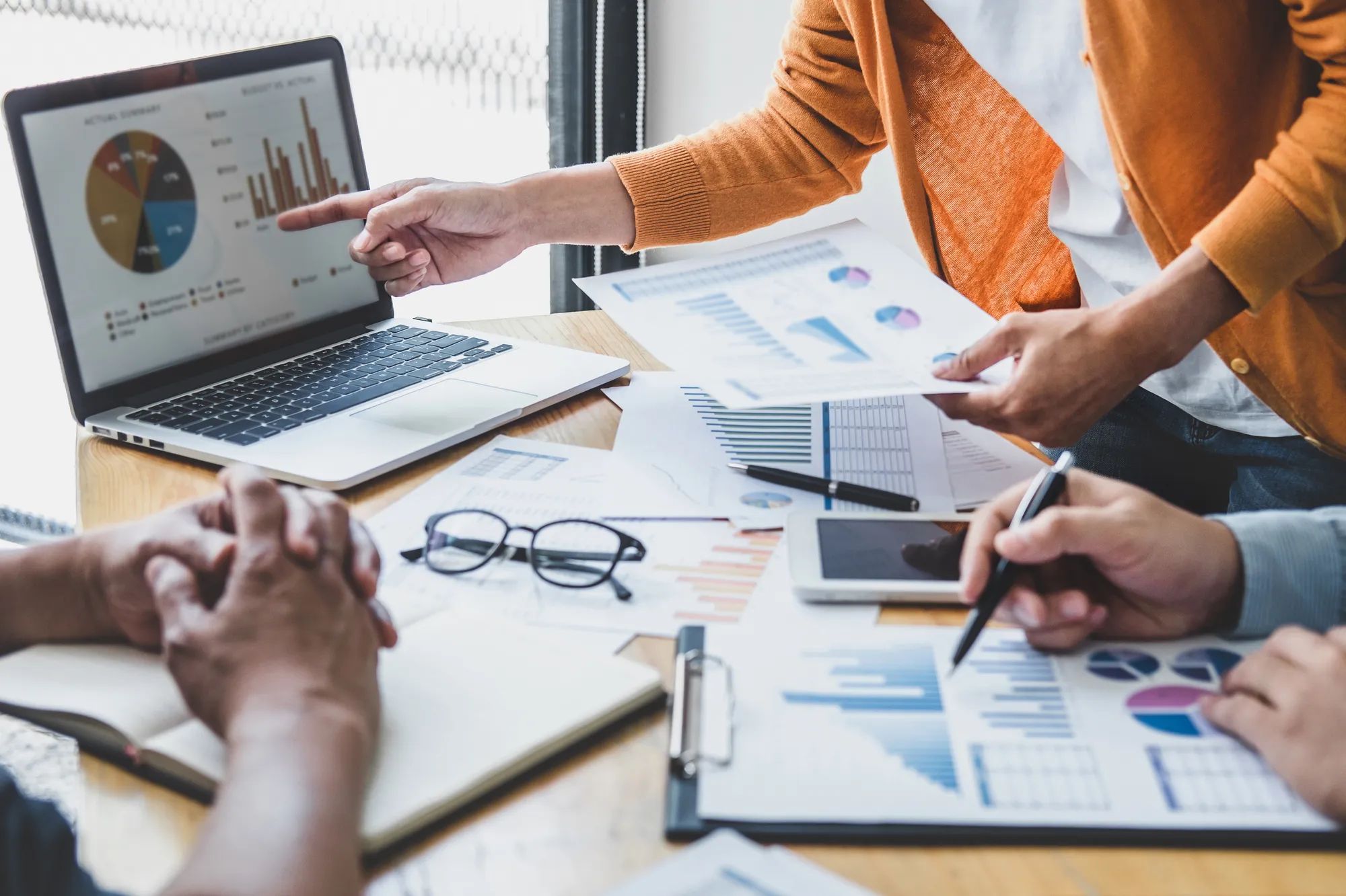 Business team meeting to conference, collaboration discussing working analyzing with financial data and marketing business strategy project, presentation and brainstorming to making profit of company.