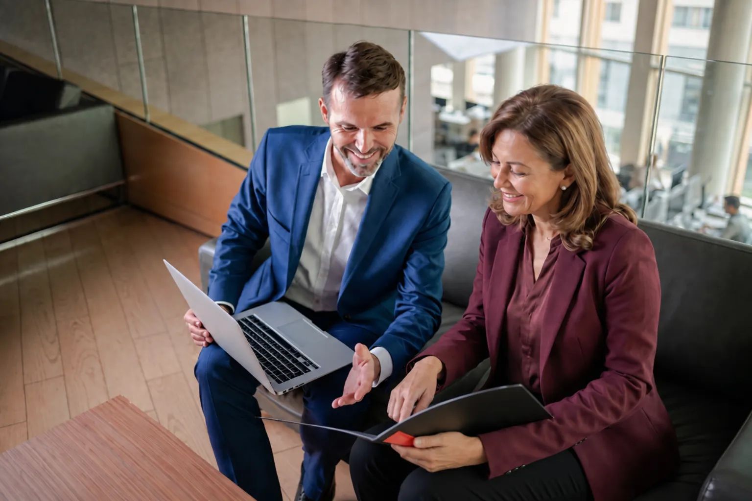 two people reviewing documents