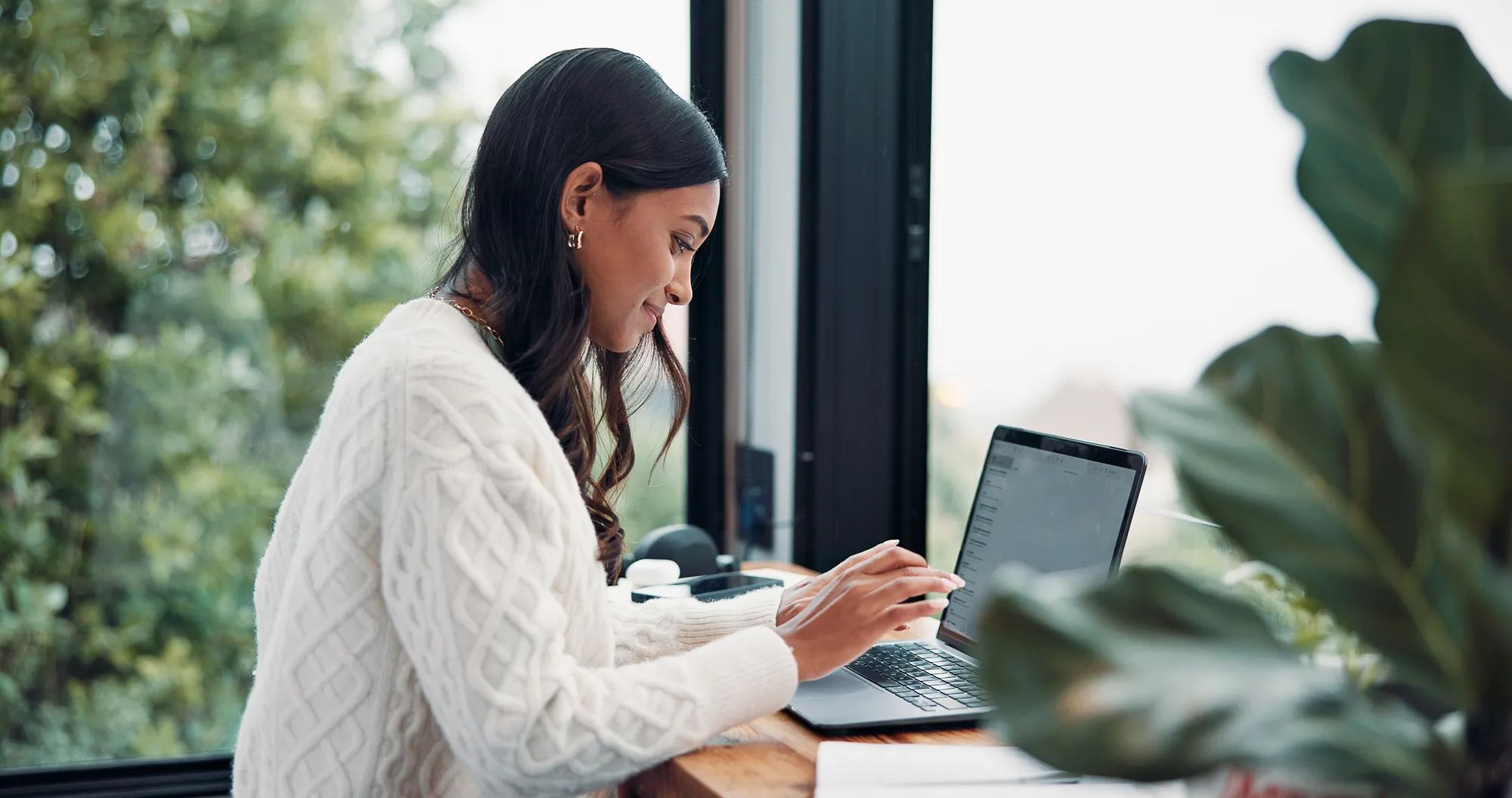 Woman, email or remote work in home with laptop for HR support, payroll or benefits administration. Person, typing or review in house with computer for employee policy, management report or planning