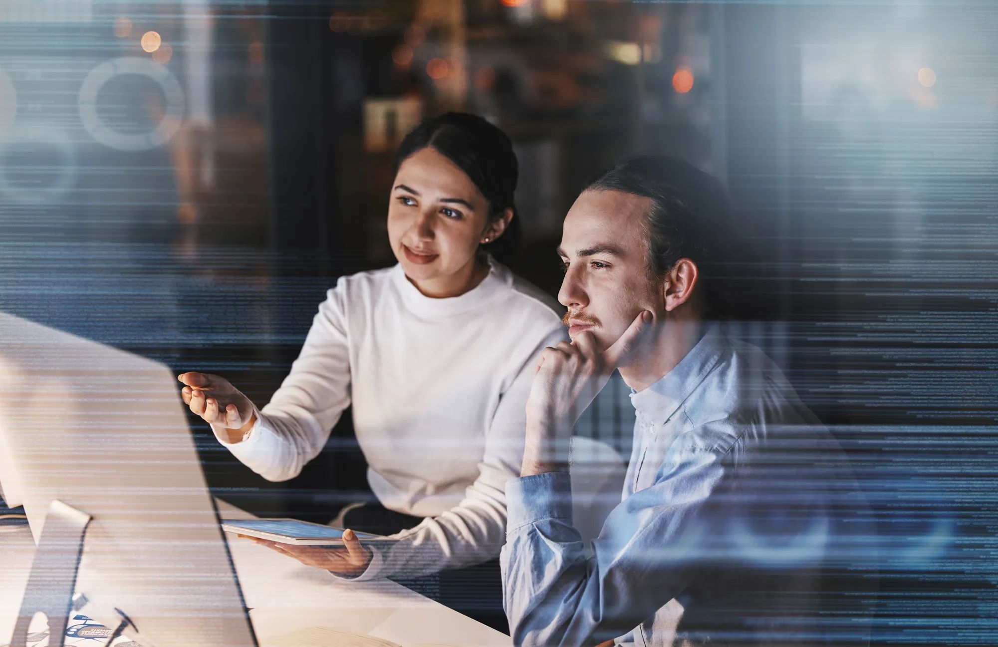 Cybersecurity overlay, futuristic team data and ux computer database of it workers talking. Tablet, digital hologram and information technology work of a office team working on research at night.