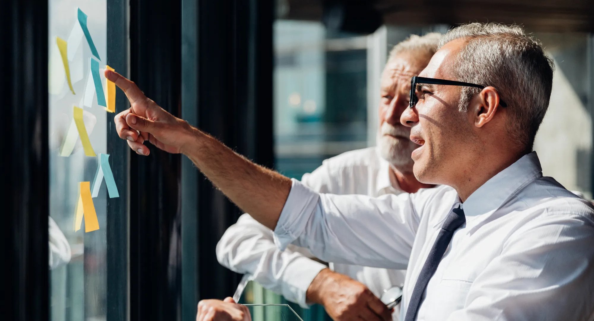 Cinematic images of corporate business team meeting discussion and startup concept. Successful businesspeople working with new startup project. Idea presentation, analyze plans.