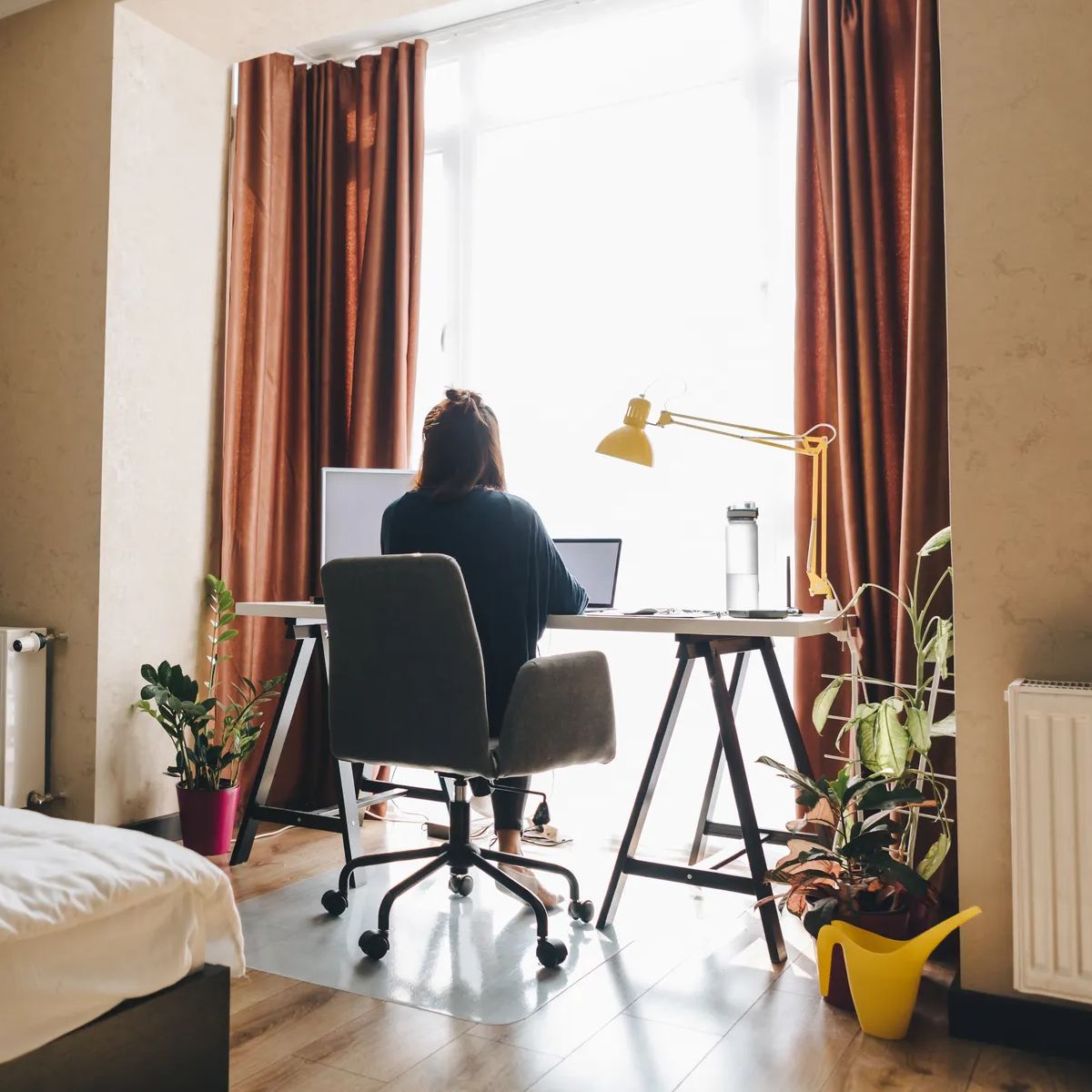 woman working on laptop at home. telework. freelance concept