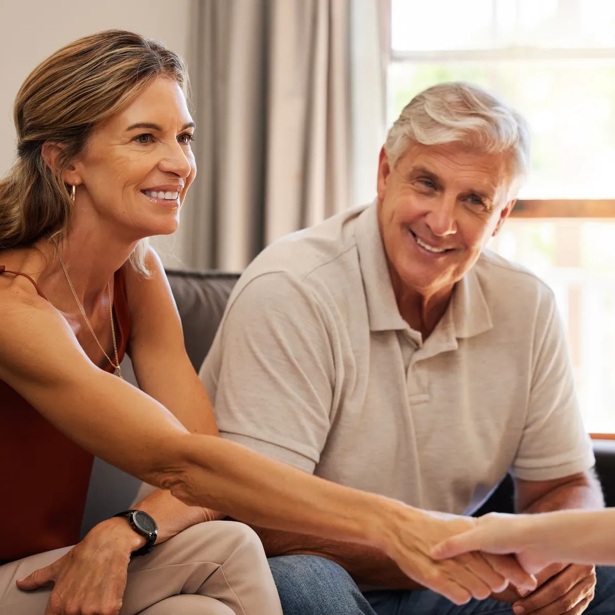 Senior couple, handshake and finance worker welcome, thank you or agreement with consulting with money or retirement savings. Advisor planning funeral insurance, cash growth or investment with client.