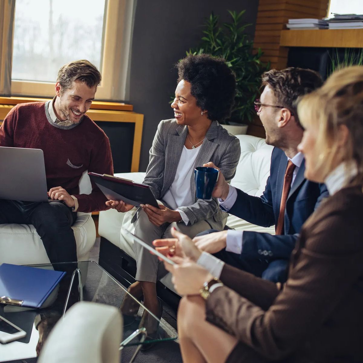 Group of businesspeople talking in the office