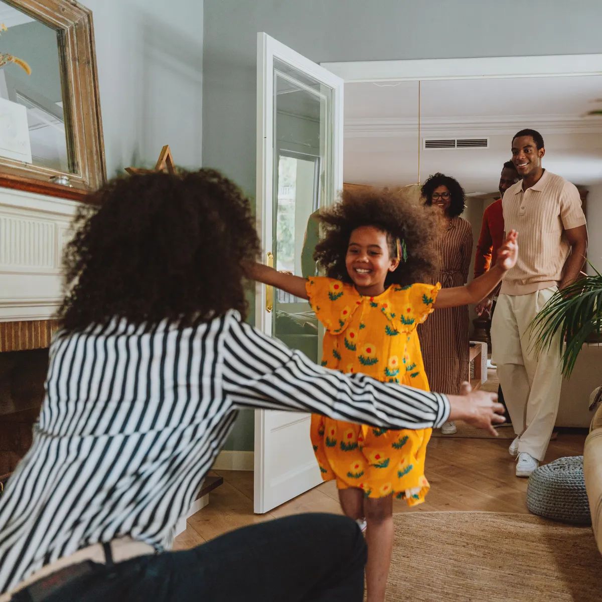 Storytelling image of a Family reunited at parents house  for lunch on the holidays. Family members celebrating at home eating good food, sharing love and positive emotions.