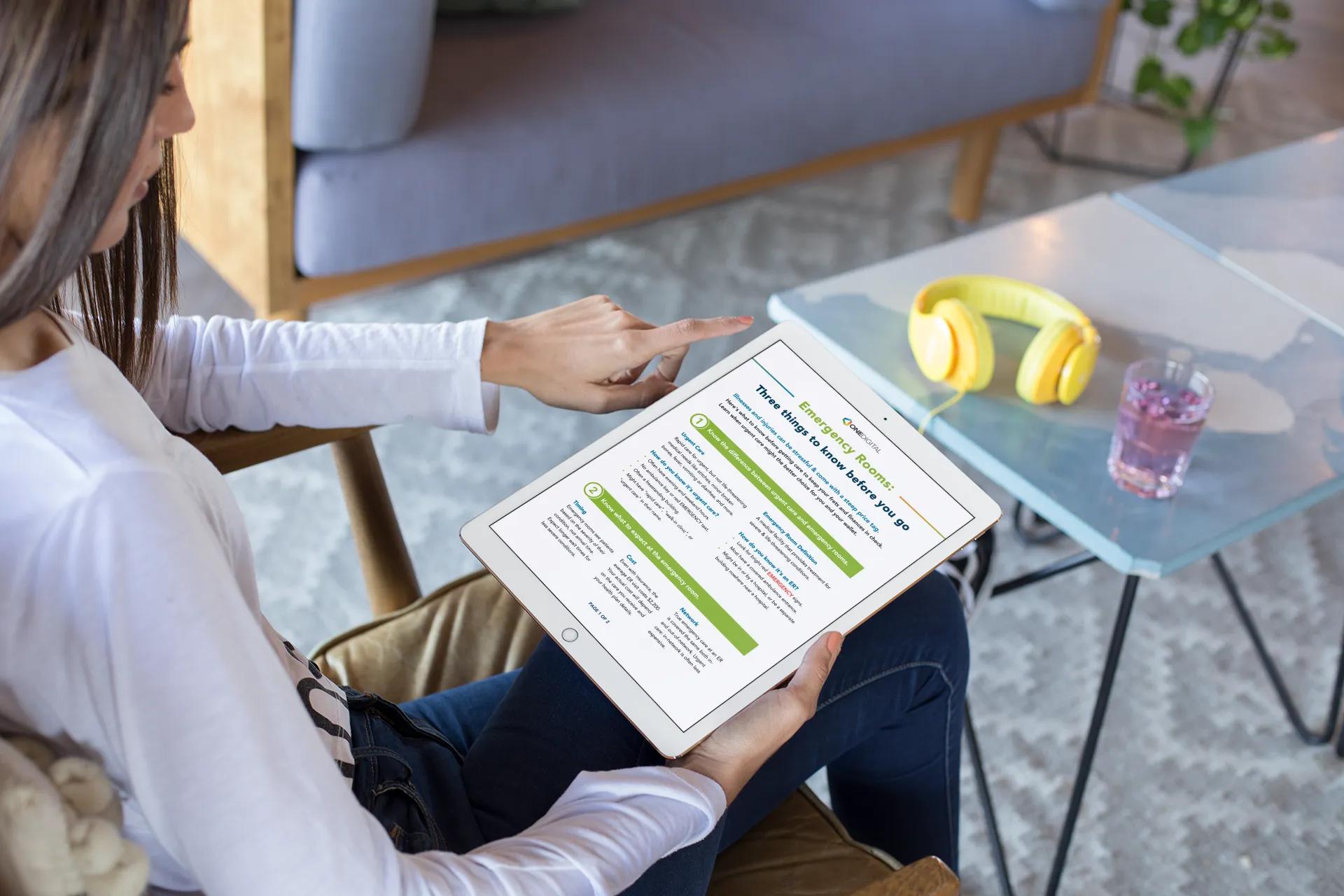 ipad-pro-mockup-of-a-girl-sitting-in-a-living-room-24791